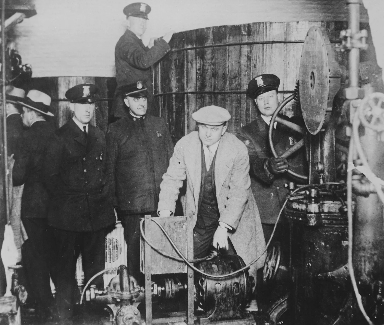 Black-and-white photo of a Prohibition-era still raid in Detroit